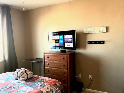 A place to put your keys, clothes and entertainment