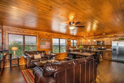 Spacious living room is perfect for bringing everyone together! (Couch also turns into Queen sofa sleeper)