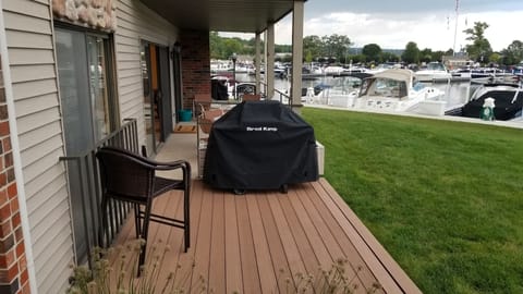 Deck area outside of master bedroom slider and patio in back ground