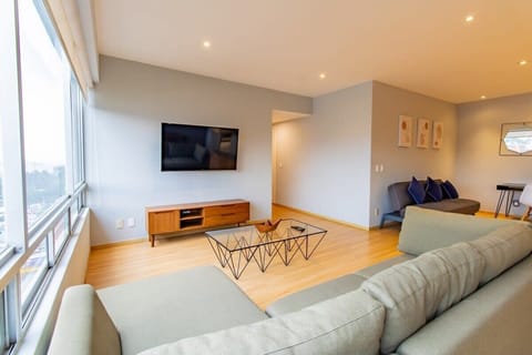 Cozy living room with a TV