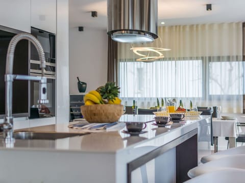 Interior Design, Kitchen, Countertop, Light Fixture, Furniture, Kitchen Appliance, Ceiling, Lighting, Flooring, Cabinetry