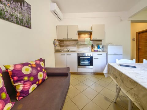 Cabinetry, Property, Furniture, Countertop, Home Appliance, Kitchen Stove, Lighting, Kitchen Appliance, Comfort, Living Room