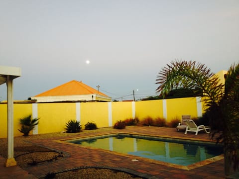 Private pool at dusk in the moonlight