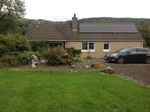 Cottage has solar panels for energy.