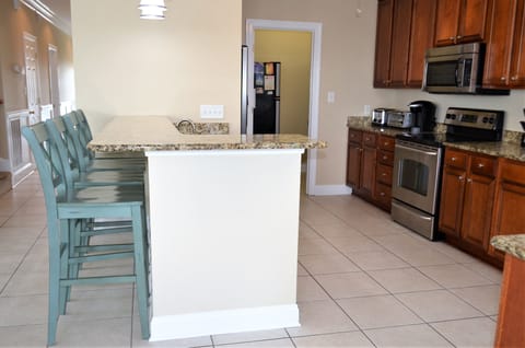 Breakfast Bar overlooking Fully Equipped Kitchen