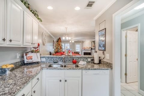 Single door oven, new dishwasher, microwave, refrigerator and granite counter 