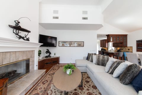 Beautiful bright and open living room with an abundance of natural light & views