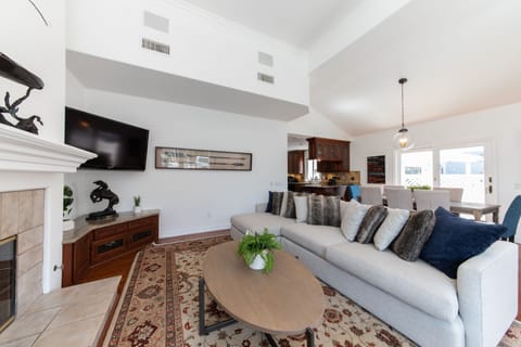 Beautiful bright and open living room with an abundance of natural light & views