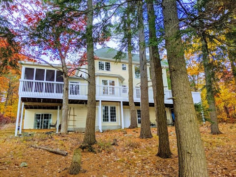 Main cottage from the lake during the beautiful fall colour season!