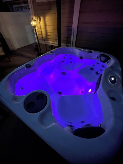 Jacuzzi at night with colorful light