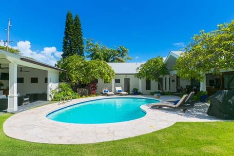 Pool with cabana and large yard