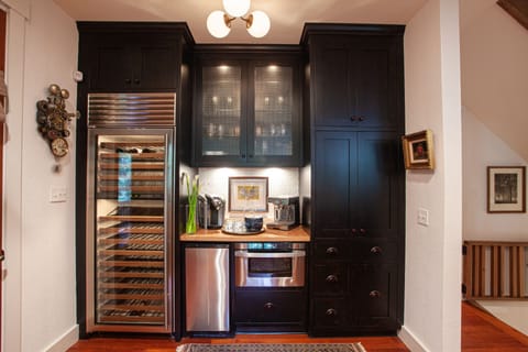 Wine cooler and coffee bar with standard drip & Keurig coffee maker.