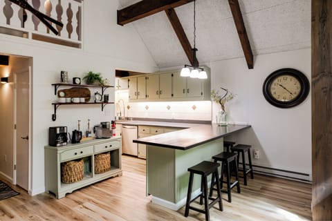 Ample overflow bar seating at the kitchen.