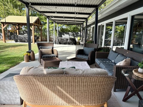 We added louvered pergolas that span the entire back area of our home! 75 feet!