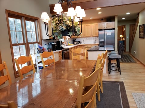 Dining Table with kitchen in background