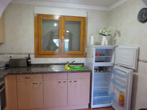 Kitchen with fridge freezer
