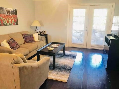 Open living area that opens up to a large patio and entertaining area.