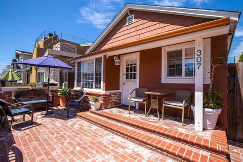 Plenty of seating out front and nice gated area for the little ones to play in!