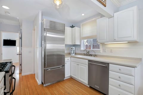 Fresh stainless steel appliance add to the relaxing atmosphere of this two cottage property!