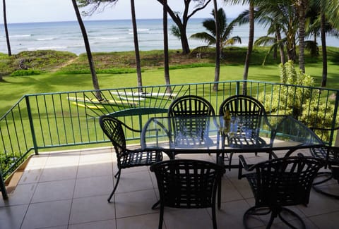 Covered outdoor eating area, with more seating to the left.  Fabulous wide view.