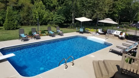 Pool & patio area w/firepit (Pool available May - September weather permitting)