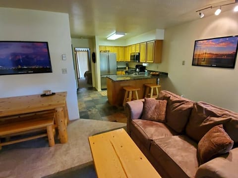 This is the main living area upstairs with fireplace and kitchen 