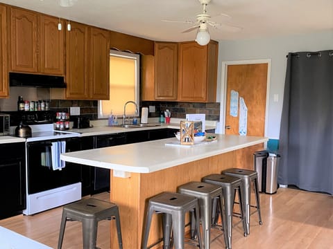 The 8 foot island is the best place to hang with people you love! 