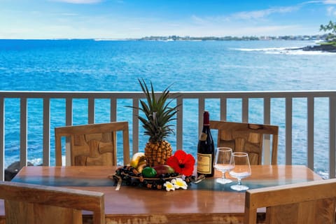 Savor morning Kona coffee or sunset mai tais on your private lanai with panoramic oceanfront views.