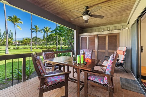 Sip your drink of choice on this charming lanai with golf course views and gentle trade winds cooling your private retreat.