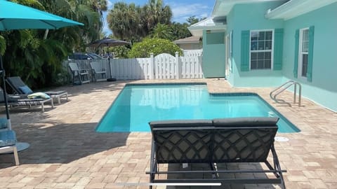 Heated pool with 9’ deep end