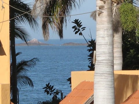 The view from our balcony !...right across the street from the beach