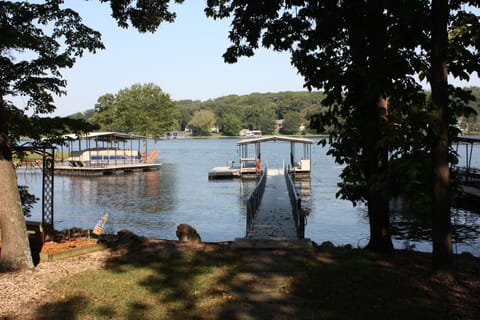 From the backyard looking at the private dock which is included in the house