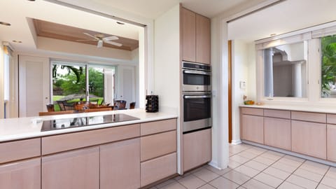 Newly updated appliances in the spacious kitchen. A nice assortment of spices and oils are provided.