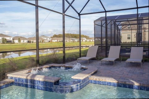 Private Pool and Spa
Lounge by the sparkling pool or soak in the spa on your screened patio oasis.
