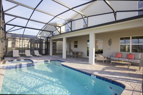 Private Pool and Spa
Lounge by the sparkling pool or soak in the spa on your screened patio oasis.
