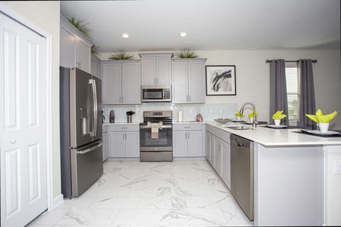 Fully-Equipped Kitchen
Whip up delicious meals in the modern kitchen with everything you need.