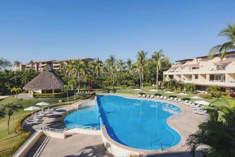 Inviting pool surrounded by tropical vibes

