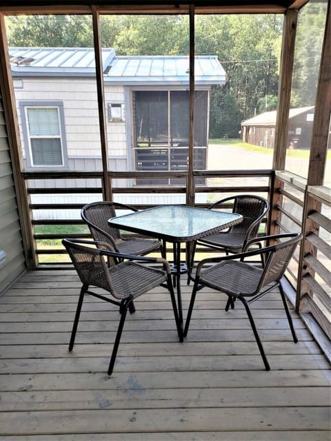 Screen porch with outdoor seating