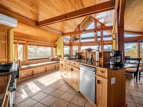 Well appointed gourmet kitchen and seating with long range views.