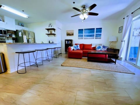 Fully Stocked Kitchen with Island and 4 bar stools.  USB Plug at end of Island.