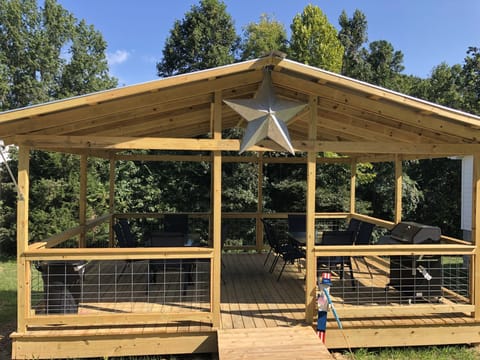 Grilling pavilion that has gas grill and seating for 12 for entertaining