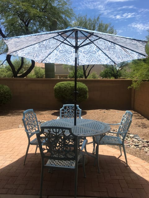 Enjoy backyard dining on the lovely patio equip with propane grill 