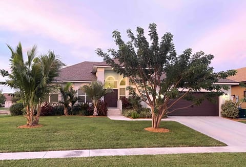 Front of house with lush landscaping