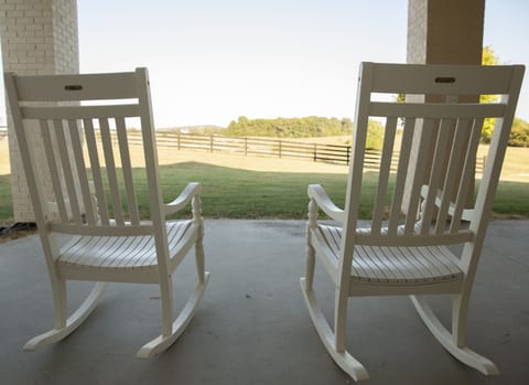Rocking chairs overlooking the rolling hills