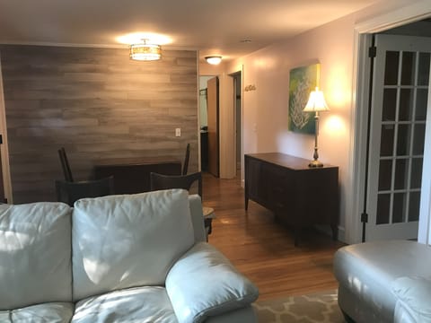 Living room leading to the bedrooms and bathroom.
