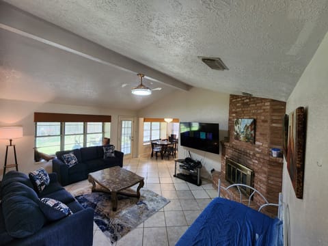 Living Room - 72" TV, 2 pull out couches and a day bed.