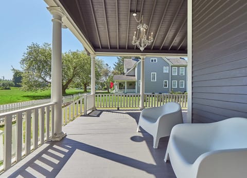 Gather on the grand front porch to marvel at the surrounding homes and park.