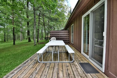 Deck features and large picnic table.