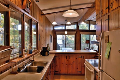 Full size appliances, pots, pans, dishes and utensils ready to use.