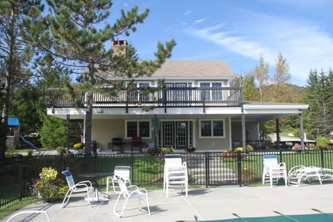 Pool Cabana with exercise room upstairs, outdoor pool table and playground
